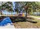 Lovely community playground nestled amongst mature trees at 16115 Country Crossing Dr, Tampa, FL 33624