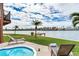 Relaxing backyard oasis with private pool, dock, and stunning water views at 16134 4Th E St, Redington Beach, FL 33708