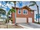 Two-story house with a two-car garage and waterfront location at 16134 4Th E St, Redington Beach, FL 33708