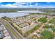 Aerial view highlighting a townhouse close to a main road at 1815 Sunset Wind Loop # 118, Oldsmar, FL 34677