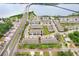 Aerial view of townhouses near a bridge and body of water at 1815 Sunset Wind Loop # 118, Oldsmar, FL 34677