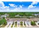 Aerial view of townhouses with garages and a spacious layout at 1815 Sunset Wind Loop # 118, Oldsmar, FL 34677
