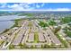 Aerial view showing the community's location near a waterway at 1815 Sunset Wind Loop # 118, Oldsmar, FL 34677