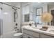 Clean bathroom with shower, tub, and double vanity at 1815 Sunset Wind Loop # 118, Oldsmar, FL 34677