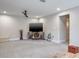 Large bonus room with a TV and plenty of space for lounging and entertaining at 1815 Sunset Wind Loop # 118, Oldsmar, FL 34677