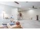 Spacious bonus room with seating area, and a view to the dining area at 1815 Sunset Wind Loop # 118, Oldsmar, FL 34677
