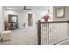 Spacious bonus room with a TV, comfy seating area, and plenty of natural light at 1815 Sunset Wind Loop # 118, Oldsmar, FL 34677