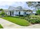 Community clubhouse with light blue exterior and a gray roof at 1815 Sunset Wind Loop # 118, Oldsmar, FL 34677