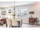 Dining area with chandelier and built-in wine rack at 1815 Sunset Wind Loop # 118, Oldsmar, FL 34677