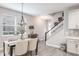 Bright dining area with view of entryway and kitchen at 1815 Sunset Wind Loop # 118, Oldsmar, FL 34677