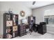Functional home office with L-shaped desk and storage at 1815 Sunset Wind Loop # 118, Oldsmar, FL 34677