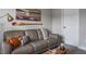 Sophisticated home office with leather couch and decor at 1815 Sunset Wind Loop # 118, Oldsmar, FL 34677