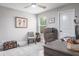 Bright home office features built-in desk and comfortable seating at 1815 Sunset Wind Loop # 118, Oldsmar, FL 34677