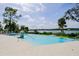 Infinity pool with scenic view and water feature at 1815 Sunset Wind Loop # 118, Oldsmar, FL 34677