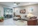 Living room with sliding glass doors to patio at 1815 Sunset Wind Loop # 118, Oldsmar, FL 34677