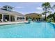 Relaxing community pool with plenty of lounge chairs at 1815 Sunset Wind Loop # 118, Oldsmar, FL 34677