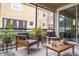 Peaceful screened patio with comfortable seating and potted plants at 1815 Sunset Wind Loop # 118, Oldsmar, FL 34677
