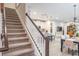 Carpeted staircase leading to upper level at 1815 Sunset Wind Loop # 118, Oldsmar, FL 34677