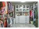 Large walk-in closet with ample shelving and hanging space at 1815 Sunset Wind Loop # 118, Oldsmar, FL 34677