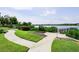 Walkway to the waterfront with scenic views at 1815 Sunset Wind Loop # 118, Oldsmar, FL 34677