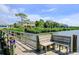 Wooden dock with bench overlooking the water at 1815 Sunset Wind Loop # 118, Oldsmar, FL 34677