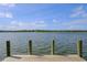 Wooden dock with scenic waterfront views at 1815 Sunset Wind Loop # 118, Oldsmar, FL 34677