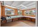Bright bonus room featuring natural light and a large countertop perfect for a workshop or crafting area at 200 57Th S Ave, St Petersburg, FL 33705