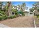 Inviting home exterior with well-maintained landscaping and a charming front entrance for a welcoming first impression at 200 57Th S Ave, St Petersburg, FL 33705