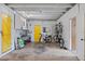 Bright garage with room for bikes, storage, and a workbench at 200 57Th S Ave, St Petersburg, FL 33705