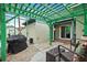 Outdoor patio with pergola, seating area, and grill at 200 57Th S Ave, St Petersburg, FL 33705