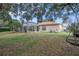 Large backyard with screened pool and patio at 2342 Edelweiss Loop, Trinity, FL 34655