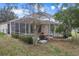 Backyard view showing screened pool and patio at 2342 Edelweiss Loop, Trinity, FL 34655