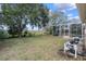 Backyard oasis with pool, screened enclosure and open space at 2342 Edelweiss Loop, Trinity, FL 34655