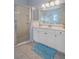 Bathroom with vanity, shower, and tiled floors at 2342 Edelweiss Loop, Trinity, FL 34655