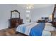 Main bedroom with king-size bed and private access to patio at 2342 Edelweiss Loop, Trinity, FL 34655