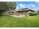 Community gazebo with picnic tables and lush landscaping at 2342 Edelweiss Loop, Trinity, FL 34655