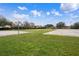 Outdoor multi-use court with basketball and open area at 2342 Edelweiss Loop, Trinity, FL 34655