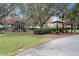 playground with play structures and picnic tables at 2342 Edelweiss Loop, Trinity, FL 34655