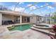 Inviting screened pool area with spa and patio at 2342 Edelweiss Loop, Trinity, FL 34655