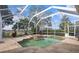 Inviting screened pool area with spa and patio at 2342 Edelweiss Loop, Trinity, FL 34655