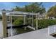 Private dock with boat lift at 337 Coffee Pot Ne Dr, St Petersburg, FL 33704