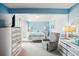 Spacious main bedroom with a comfortable recliner at 343 Rex Pl # F, Madeira Beach, FL 33708