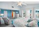 Bright bedroom with large windows and water view at 343 Rex Pl # F, Madeira Beach, FL 33708