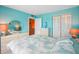 Bedroom with large mirror and double bed, light and bright at 343 Rex Pl # F, Madeira Beach, FL 33708