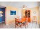 Casual dining area with wood table and chairs at 343 Rex Pl # F, Madeira Beach, FL 33708