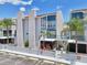 Condo building with parking and waterfront views at 343 Rex Pl # F, Madeira Beach, FL 33708