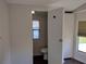 Small half bathroom with toilet and updated vanity at 34421 Countryside Dr, Wesley Chapel, FL 33543