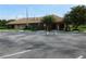 Community building with parking and landscaping at 34421 Countryside Dr, Wesley Chapel, FL 33543