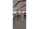 Community room featuring tables, chairs, and high ceilings at 34421 Countryside Dr, Wesley Chapel, FL 33543