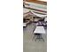 Large community room with tables and chairs at 34421 Countryside Dr, Wesley Chapel, FL 33543